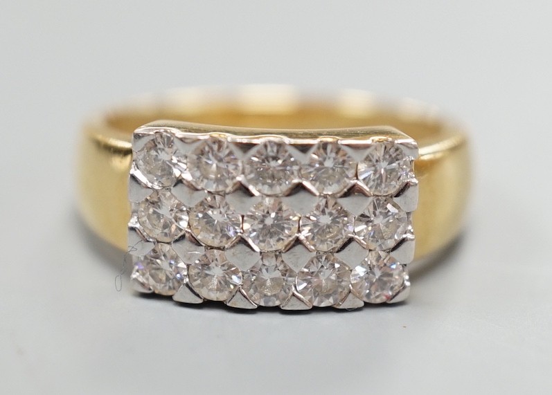 A modern 18ct gold and pave set diamond cluster ring, size K, gross weight 3.9 grams.